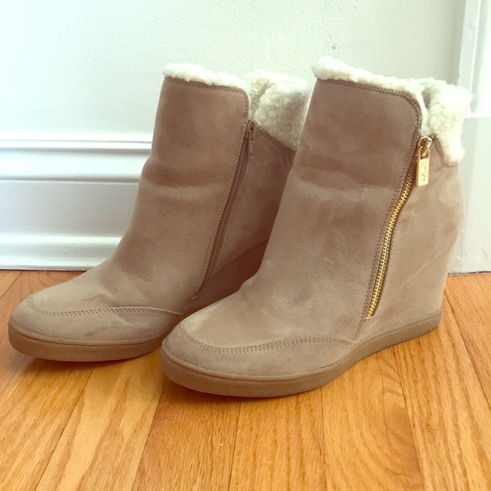 Suede tan wedge booties with gold zipper.